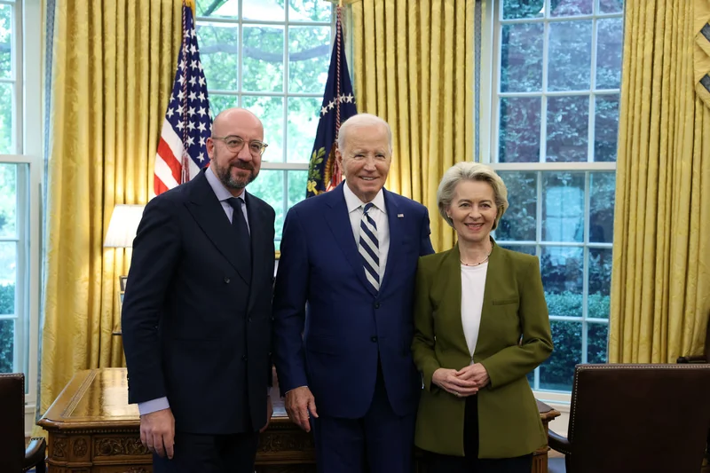 Source group photograph from a US–EU summit in 2023, used as input for the following action-figure transformation.