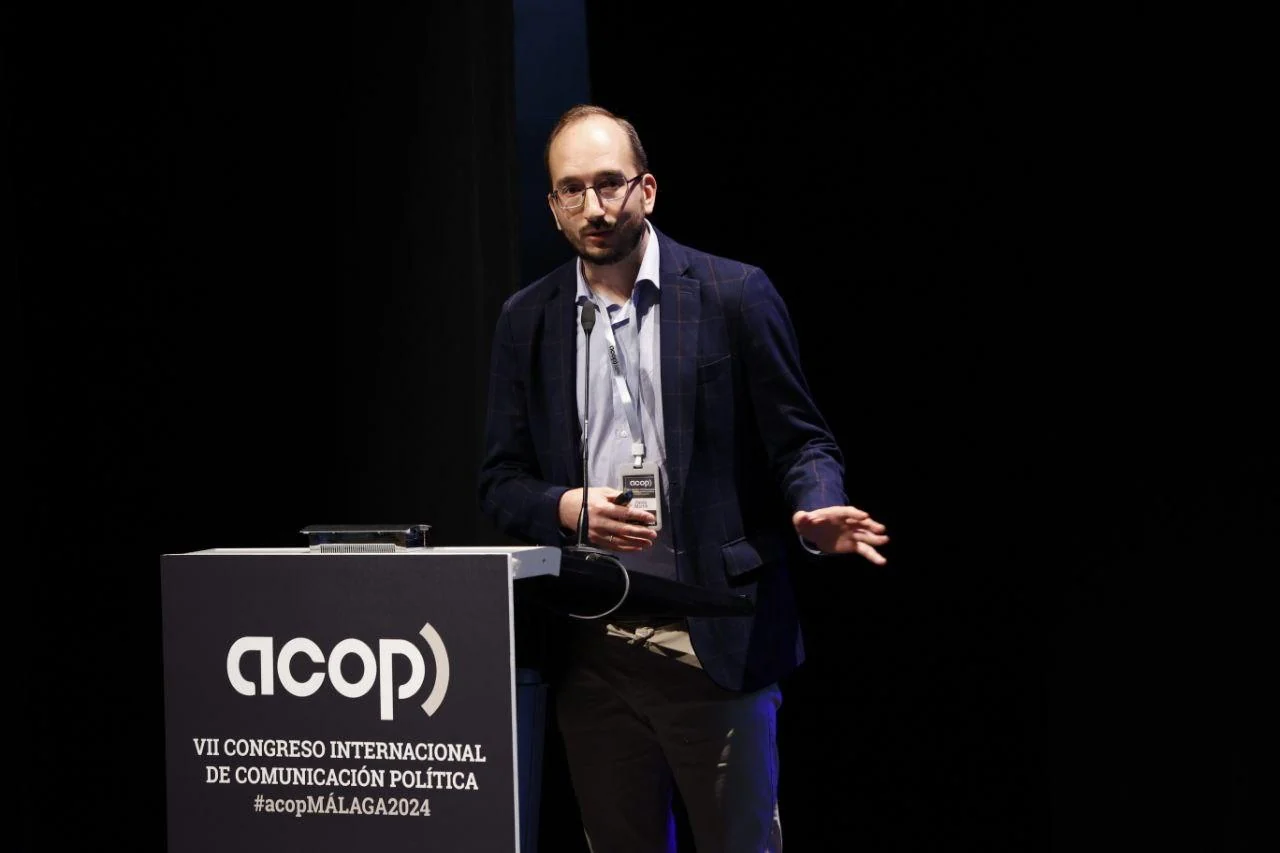 A speaker at the lectern of ACOP’s Seventh International Congress on Political Communication.