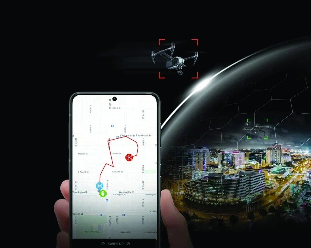Illustration of drone monitoring over a city at night, with drones highlighted and a smartphone map displaying a flight path and location markers.