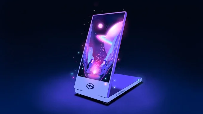 A folding Looking Glass Go display showing a colourful space scene.